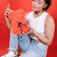 small rose teddy bear made of flowers