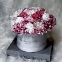 Pink and white preserved floral arrangement bouquet flower box for flower delivery in UK