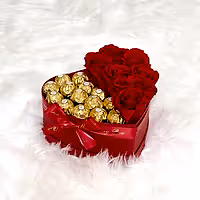 Red infinity roses and chocolate for Valentine's Day delivery in heart shaped box