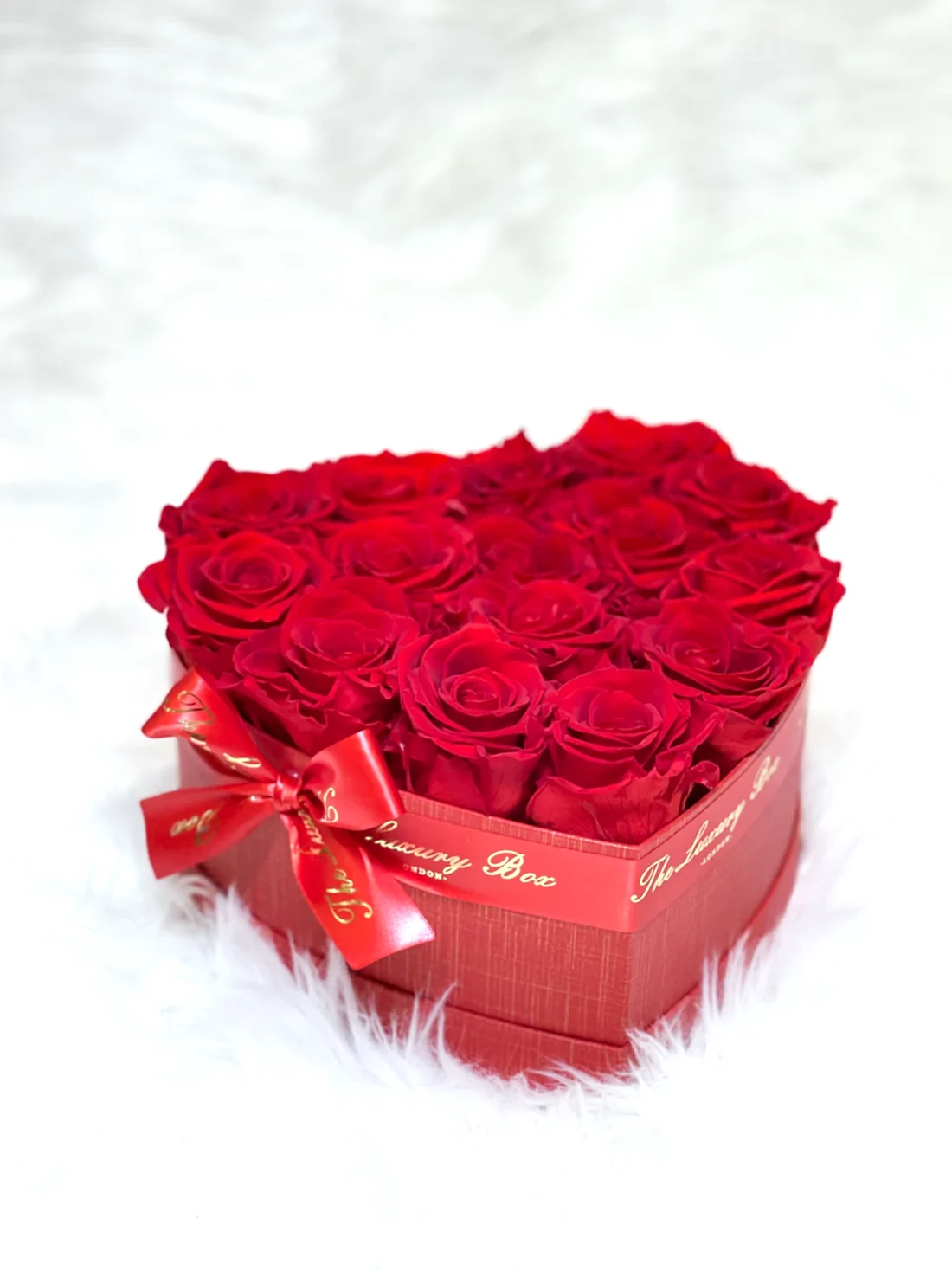 Red infinity roses for Valentine's Day delivery in heart shaped box