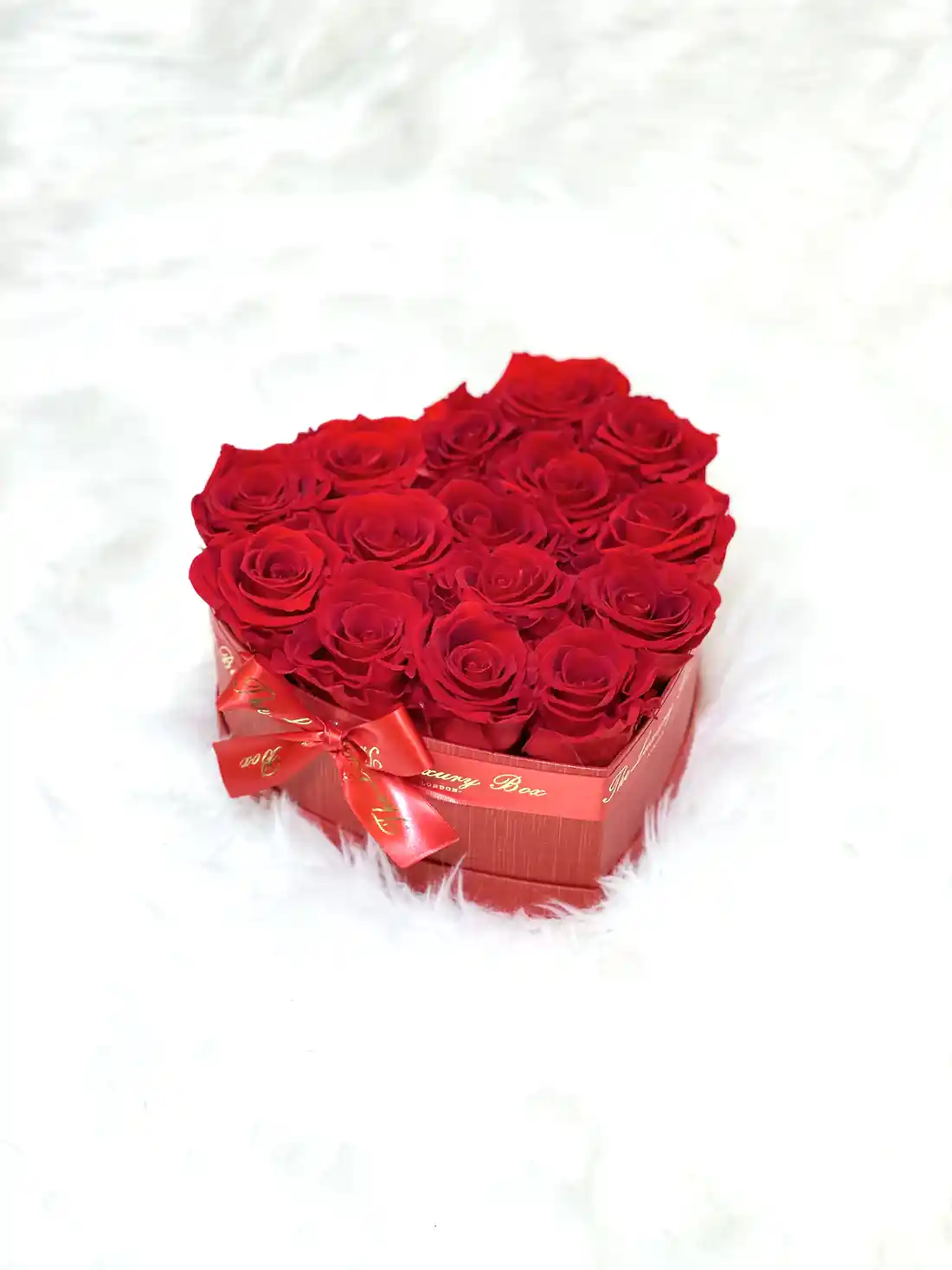 Red infinity roses for Valentine's Day delivery in heart shaped box