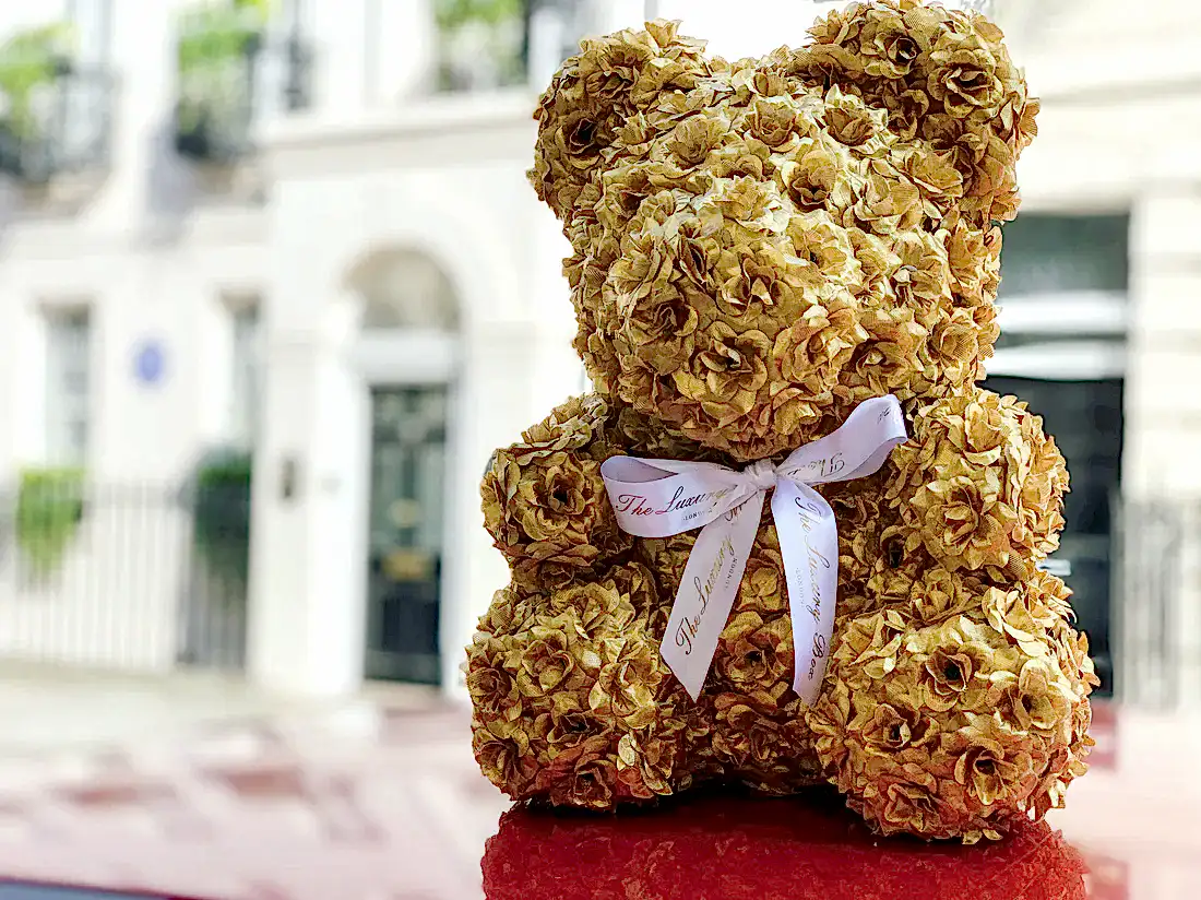 gold rose bear made of flowers
