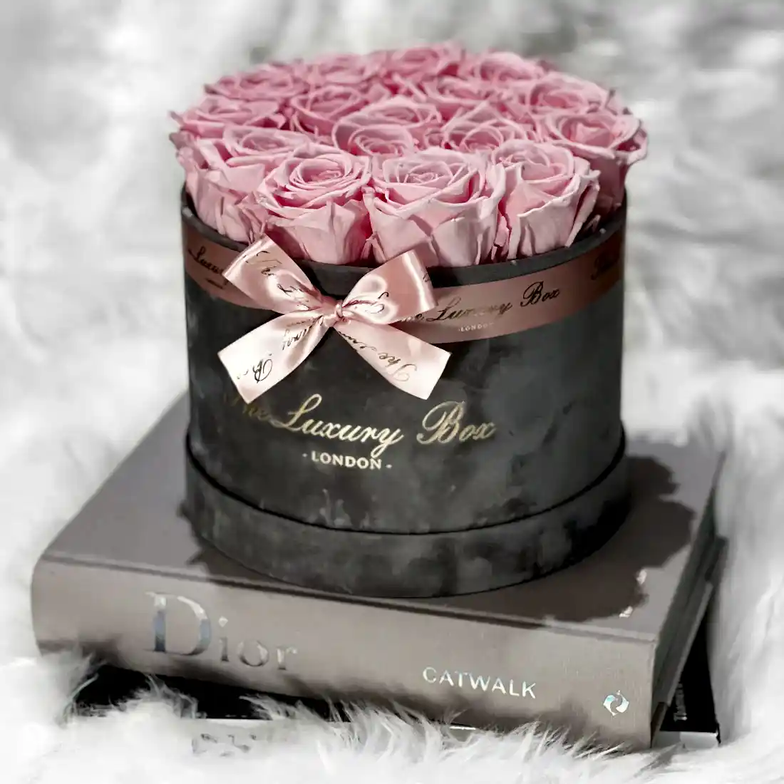 pink eternity roses in grey velvet box
